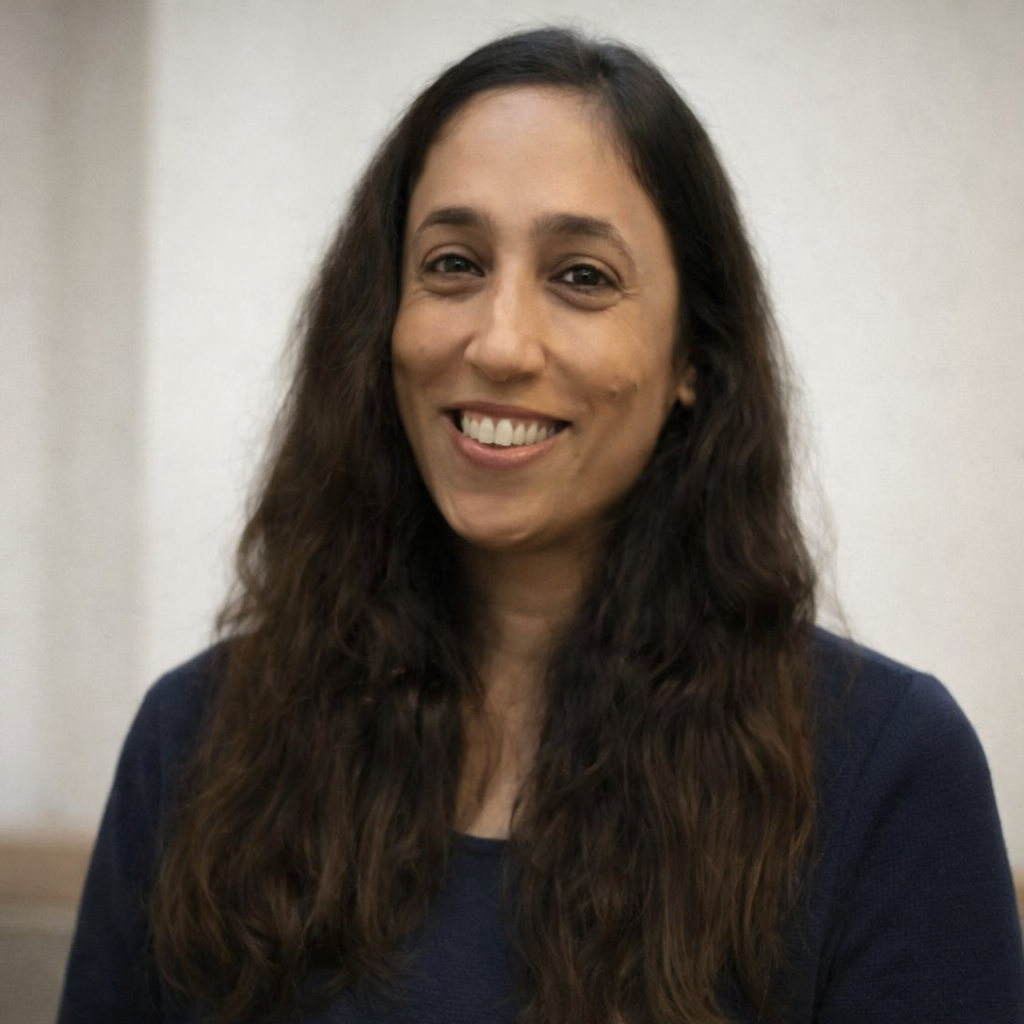 Professional headshot of Nikita Wadhwani